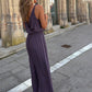 Arannyal szegélyezett derékszorító V-nyakú laza jumpsuit